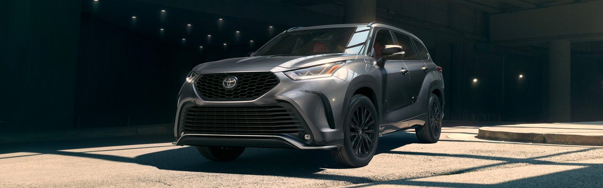 Toyota Grand Highlander driving from Bossier City, LA, towards Karl Malone Toyota of Ruston dealership.