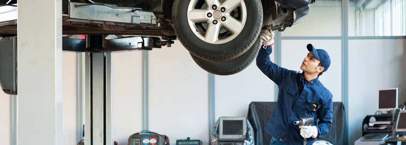 Image of a mechanic working on a car at Karl Malone Toyota of Ruston